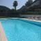 Carlino Appartamento giardino e piscina by Garda Domus Mea