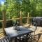 Gas fireplace, firepit, and cedar Adirondack chair - Spencer