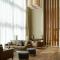 Staybridge Suites Dubai Al-Maktoum Airport, an IHG Hotel - Дубай