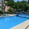 Fantastic three-room apartment with terrace, garden, swimming pool and sea view