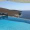 Waterfront villa "Afros" with a pool, direct access to the sea and a small beach