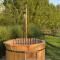 Logie Marie with hottub in the garden