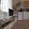 Bungalow Vincent mit Terrasse, Grill & WLAN