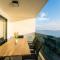 Blue waves, beachfront modern apartment