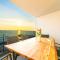 Blue waves, beachfront modern apartment