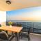 Blue waves, beachfront modern apartment