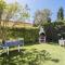Bonita casa adosada con jardín privado y piscina comunitaria Bonita casa adosada con jardín privado y piscina comunitaria