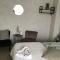 Guesthouse De Steenberg tweepersoonskamer met grote badkamer, kitchenette en tuinzicht op de eerste verdieping - 赫尔
