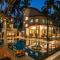 Saffronstays Casa Del Palms, Alibaug - luxury pool villa with chic interiors, alfresco dining and island bar - Alibag