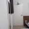 Pousada Quarto com ventilador,ar frigobar e garagem