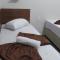 Pousada Quarto com ventilador,ar frigobar e garagem