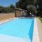 Typical house of South East France with blue shutters - Buisson