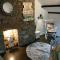 Fishermens cottage with log burner, 2 bathrooms & sea views from garden terraces
