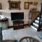 Fishermens cottage with log burner, 2 bathrooms & sea views from garden terraces