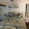 Fishermens cottage with log burner, 2 bathrooms & sea views from garden terraces