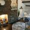 Fishermens cottage with log burner, 2 bathrooms & sea views from garden terraces