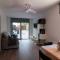 Near beaches large private patio, aircon & community pool