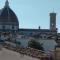 A refuge with a terrace overlooking the Duomo