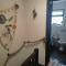 Fishermens cottage with log burner, 2 bathrooms & sea views from garden terraces