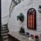 Fishermens cottage with log burner, 2 bathrooms & sea views from garden terraces