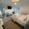 Sleeps8- EcoFriendly- KingBeds- FamilyFriendly Sleeps8- EcoFriendly- KingBeds- FamilyFriendly