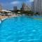 SUNSET WAVES blue sky apartment