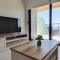 SUNSET WAVES blue sky apartment
