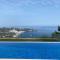Half of the luxury villa with sea view and pool in natural park - لا هيرادورا