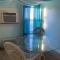 Rustic Rooftop Delight - Bay Front apts