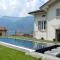 White suite - Jacuzzi, Swimming pool & Lake view