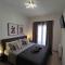 Grey Swan - Modern & Stylish apartment with Private Parking
