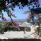 Santorious Flower Covered Apartment