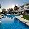 Renovated Apartment with Sea Views and Pool with Private Parking