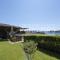 Bild des 10D - Porto Mannu grazioso bilocale con patio e giardino