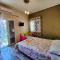 Luxury Lila House Under the Rocks