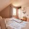 Feriendorf Rugana - Komfortplus Appartement mit 2 Schlafzimmern und Terrasse A28