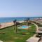 Beachfront Bliss Experience panoramic Seaview Families only - 艾因苏赫纳