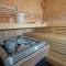 Attic apartment with pool, sauna, and fireplace