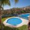 C43 - Family House with Terrace and Shared Pool