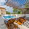 Holiday home Dusak with swimming pool and jacuzzi