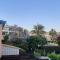 Eva Gardens corner house with stunning garden and huge swimming pool next to CORAL BAY