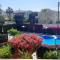Eva Gardens corner house with stunning garden and huge swimming pool next to CORAL BAY