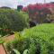 Eva Gardens corner house with stunning garden and huge swimming pool next to CORAL BAY