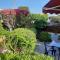 Eva Gardens corner house with stunning garden and huge swimming pool next to CORAL BAY