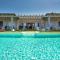 Bild des Alghero Villa Carrabufas villa con piscina vista mare per 10 persone