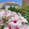 Eva Gardens corner house with stunning garden and huge swimming pool next to CORAL BAY