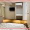 Classy Smart Designed 2BR Loft Unit FREE WIFI & NETFLIX at Fort Victoria BGC - Маніла