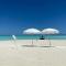 Sunrise by white sand dhigurah