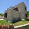 Elpida's Stone Houses