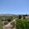 Elpida's Stone Houses